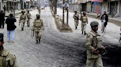 Paramilitary forces patrol the streets of Quetta following the outbreak of civil unrest. - AP Photo