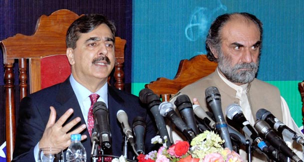 Prime Minister Syed Yousuf Raza Gilani addressing a press conference at Chief Minister Secretariat. — APP